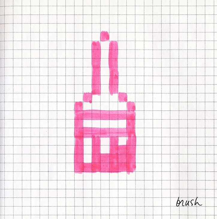 Susan Kare's hand-drawn 'brush' icon in pink marker on gridded paper, each filled square standing for one pixel.